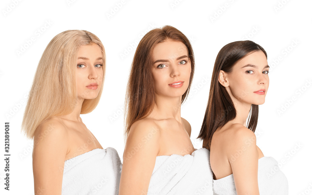 Young women with beautiful makeup on white background