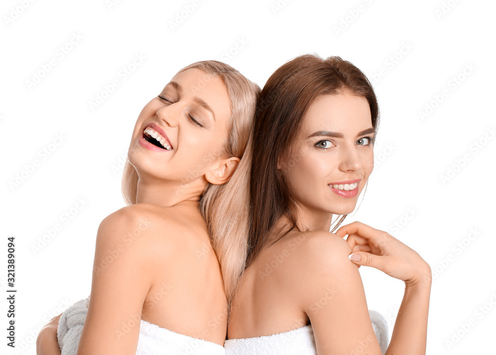 Young women with beautiful makeup on white background