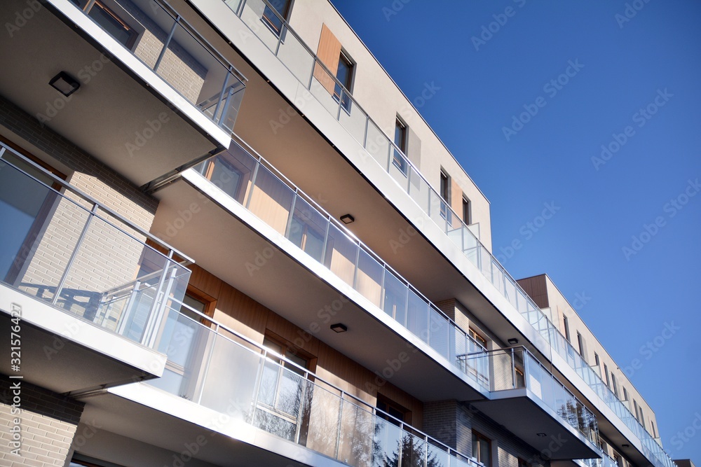 Multistory new modern apartment building with architectural details of modern architecture. 