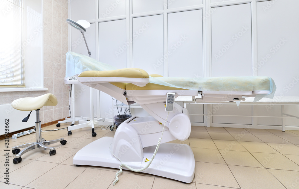 Adjustable chair in the medical office. Automatic chair in the beauty parlor for procedures.