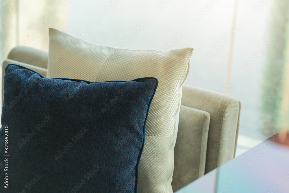 contemporary interior of Living room with part of sofa in sunny day and white curtain interior backg