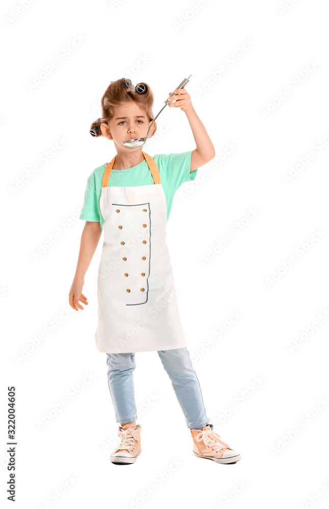 Little housewife with ladle on white background