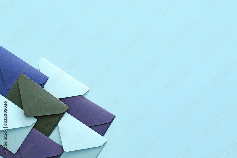 Paper envelopes on color background