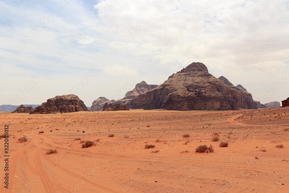 Wadi Rum desert panorama with dunes, mountains and sand that looks like planet Mars surface, Jordan