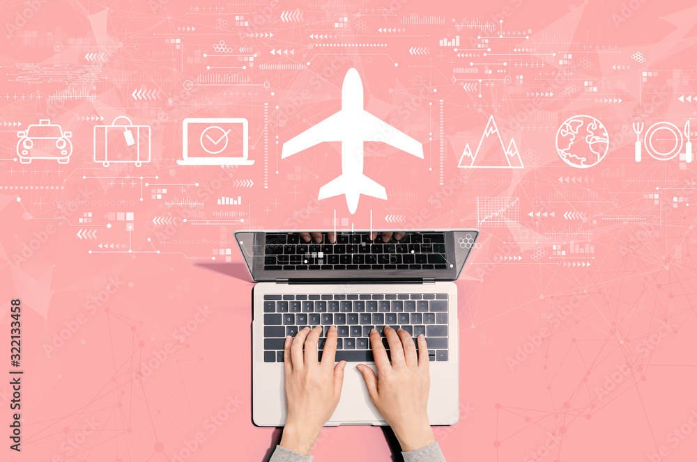 Flight ticket booking concept with person using a laptop computer