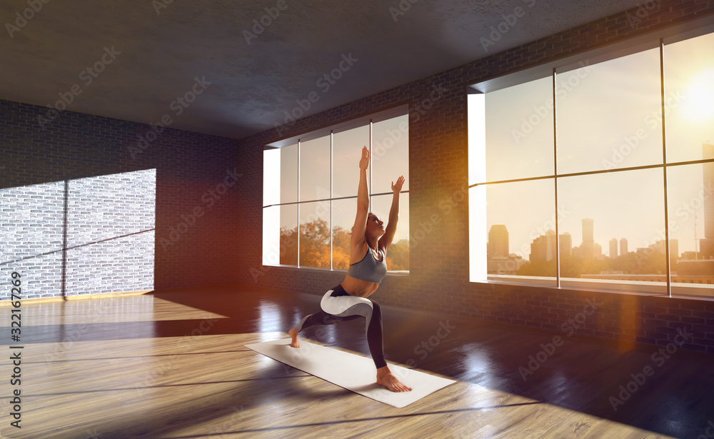 Yoga woman. Young woman doing yoga in loft on sunrise.