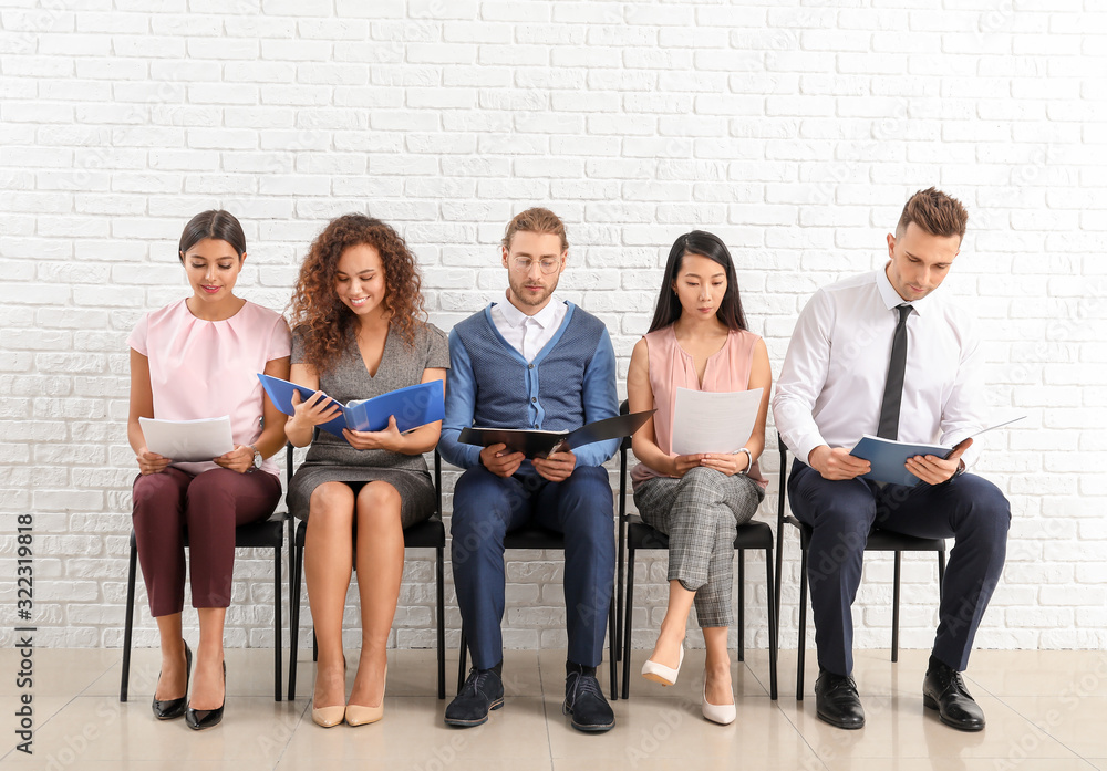 Young people waiting for job interview indoors