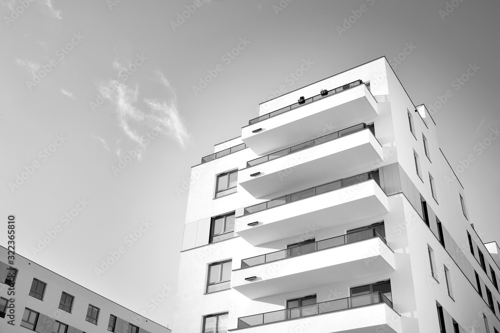 Detail of modern residential flat apartment building exterior. Fragment of new luxury house and home