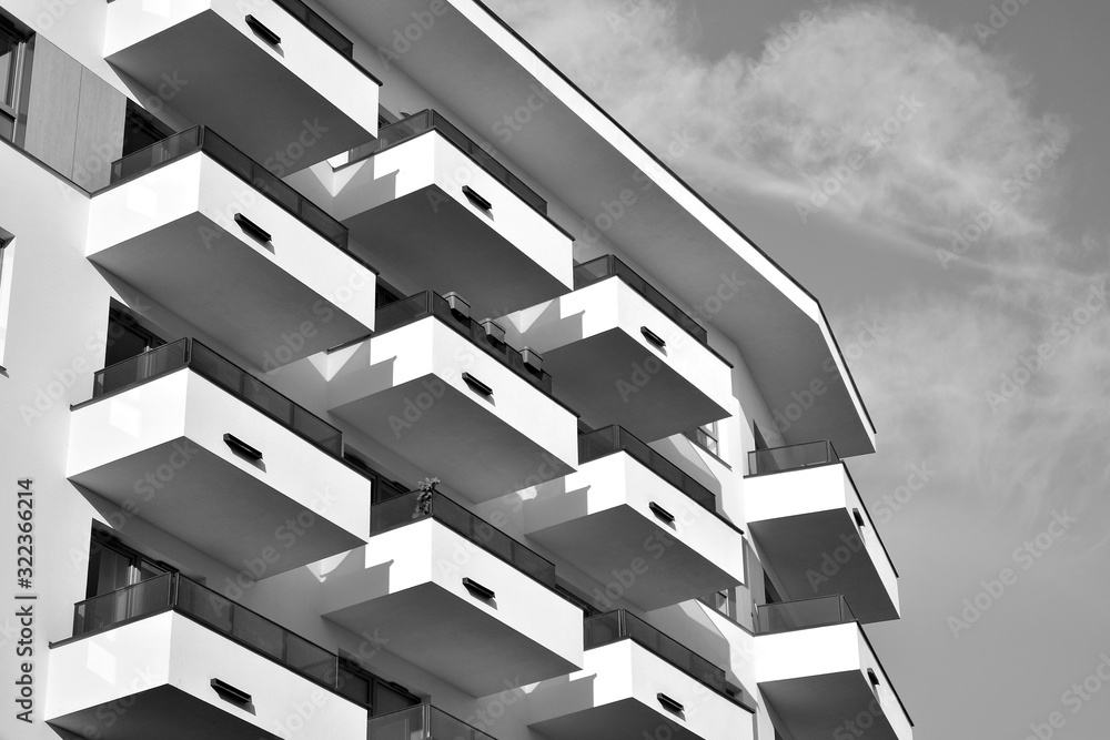 Detail of modern residential flat apartment building exterior. Fragment of new luxury house and home