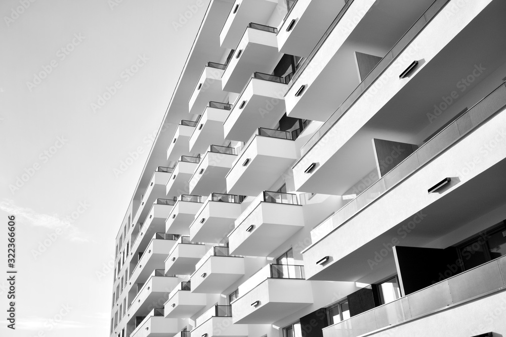 Detail of modern residential flat apartment building exterior. Fragment of new luxury house and home