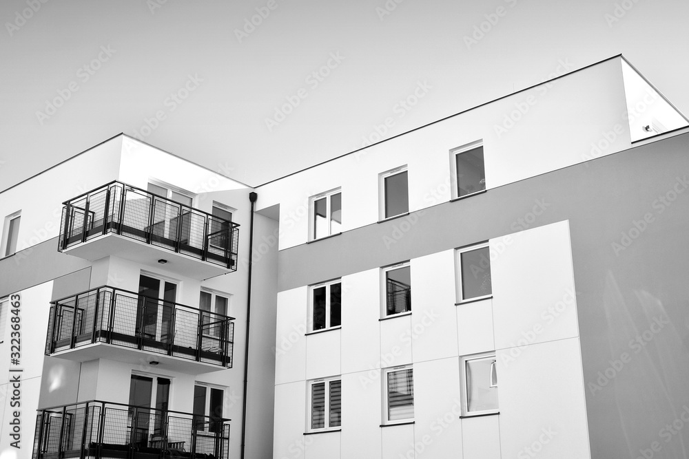 Detail of modern residential flat apartment building exterior. Fragment of new luxury house and home