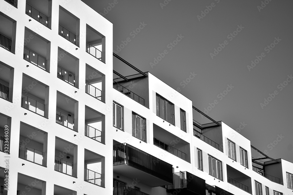 Detail of modern residential flat apartment building exterior. Fragment of new luxury house and home