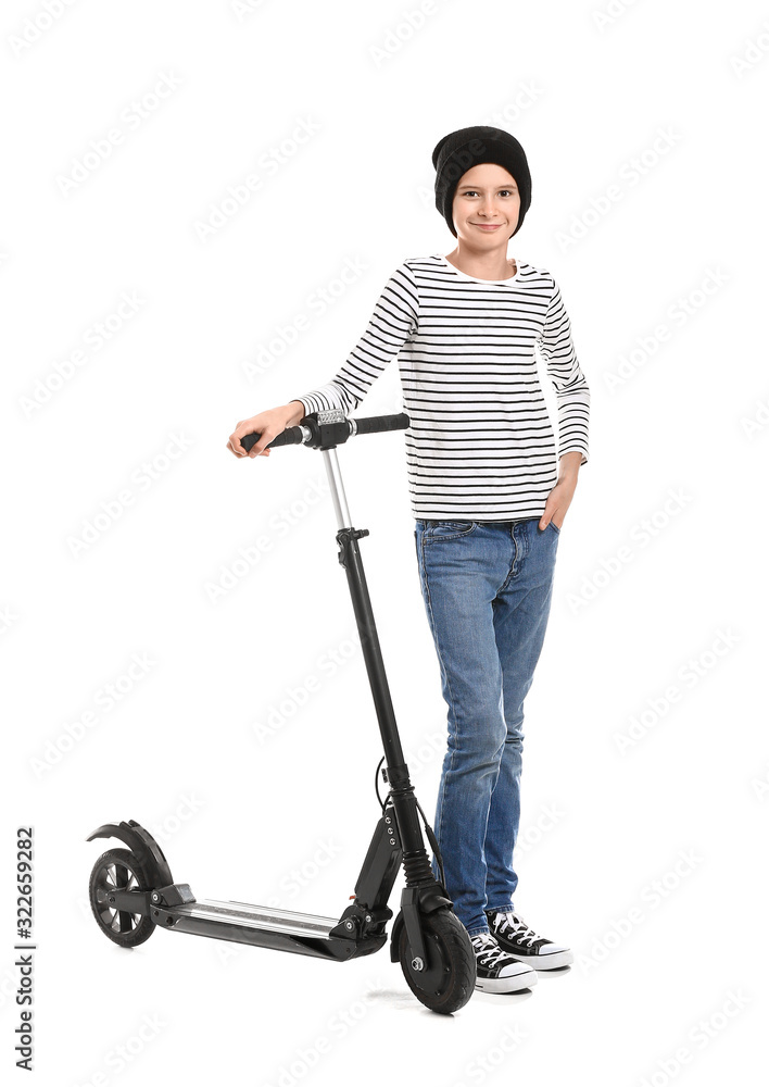 Teenage boy with kick scooter on white background