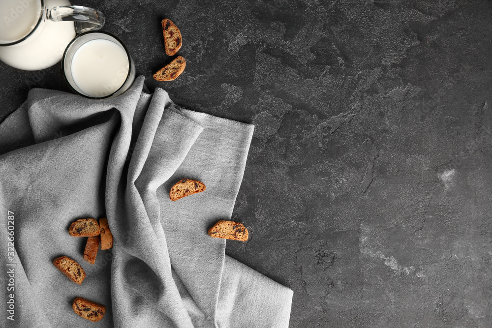 Sweet cookies and milk on table