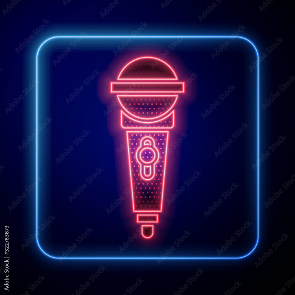 Glowing neon Microphone icon isolated on blue background. On air radio mic microphone. Speaker sign.