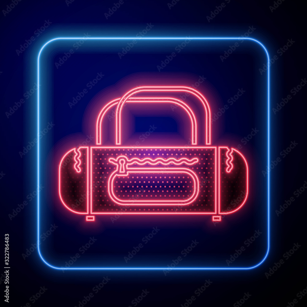 Glowing neon Sport bag icon isolated on blue background.  Vector Illustration