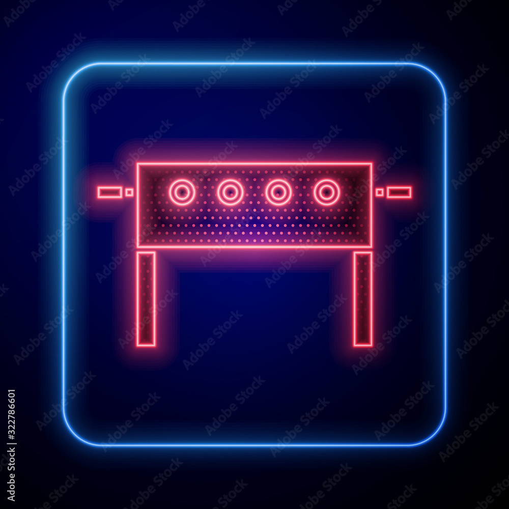 Glowing neon Hockey table icon isolated on blue background.  Vector Illustration