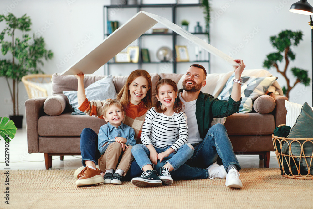 concept housing a young family. mother father and children in  new home.