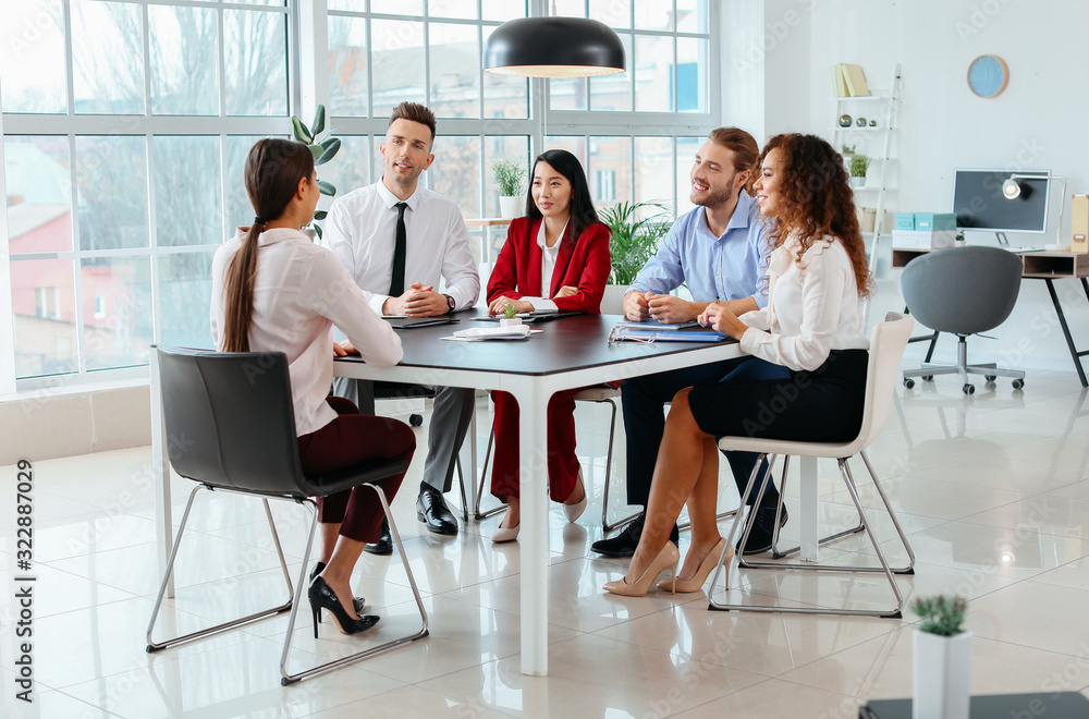 Human resources commission interviewing woman in office