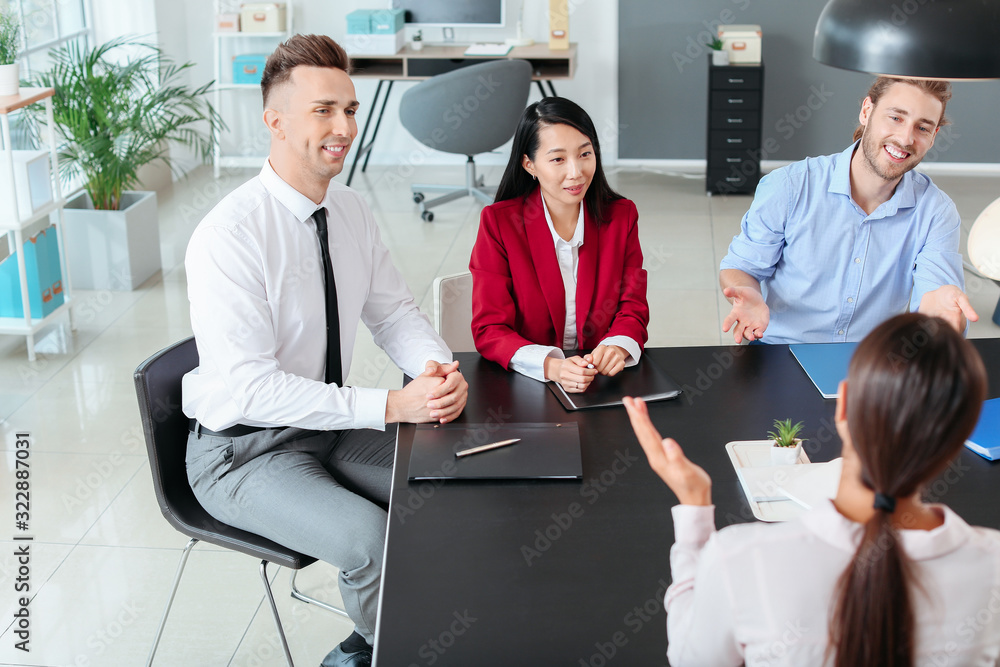 Human resources commission interviewing woman in office