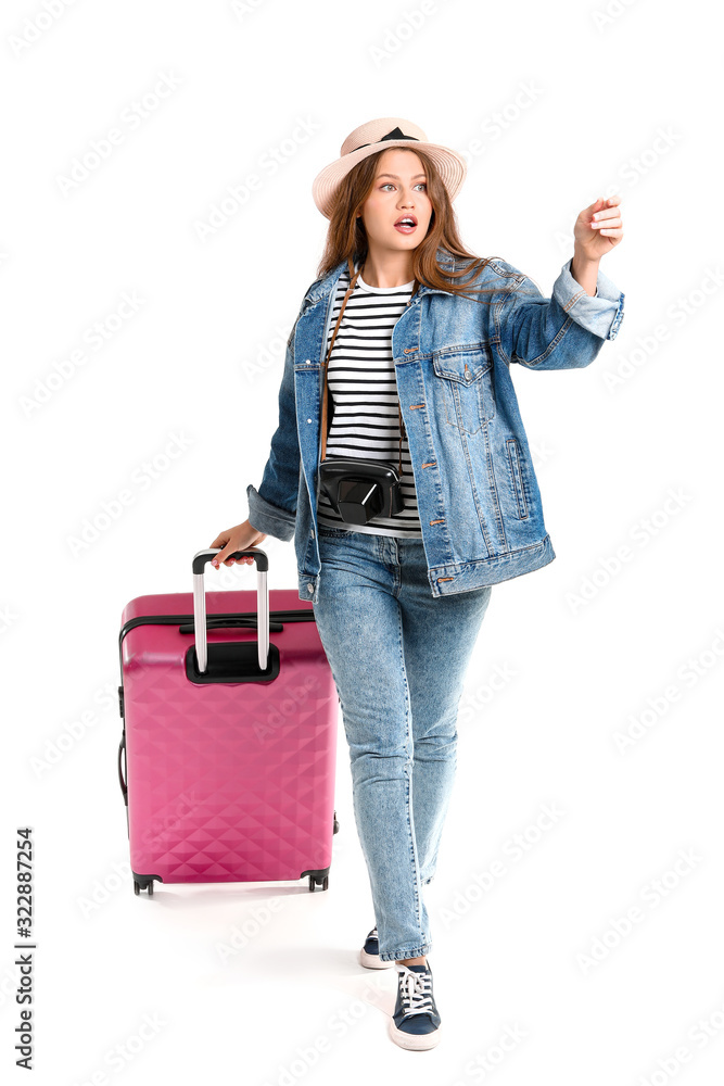 Female tourist with luggage on white background