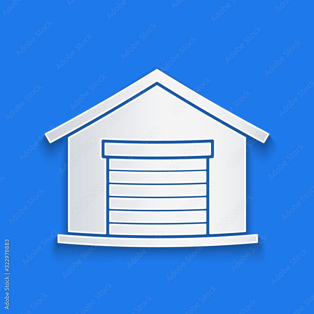 Paper cut Warehouse icon isolated on blue background. Paper art style. Vector Illustration