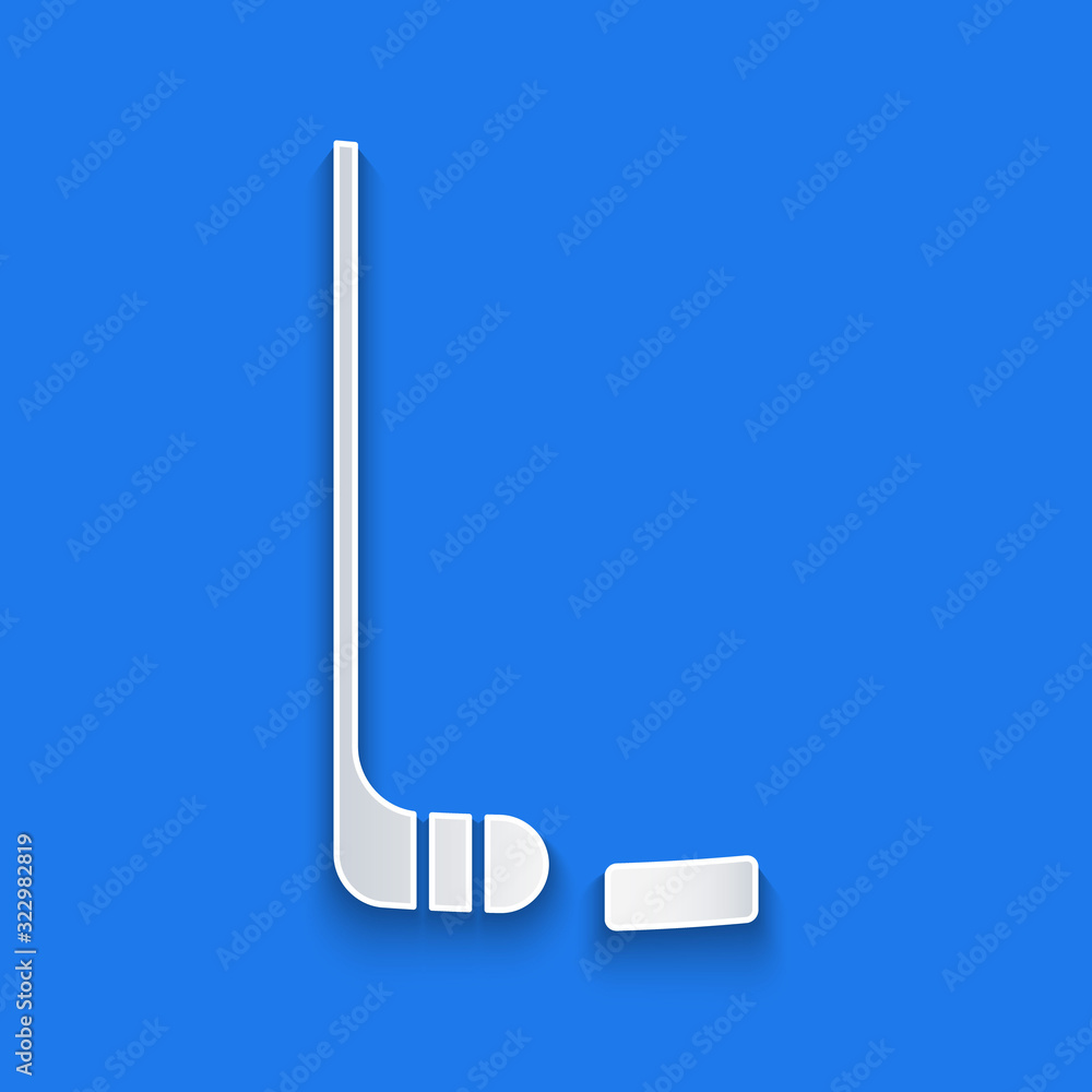 Paper cut Ice hockey stick and puck icon isolated on blue background. Paper art style. Vector Illust