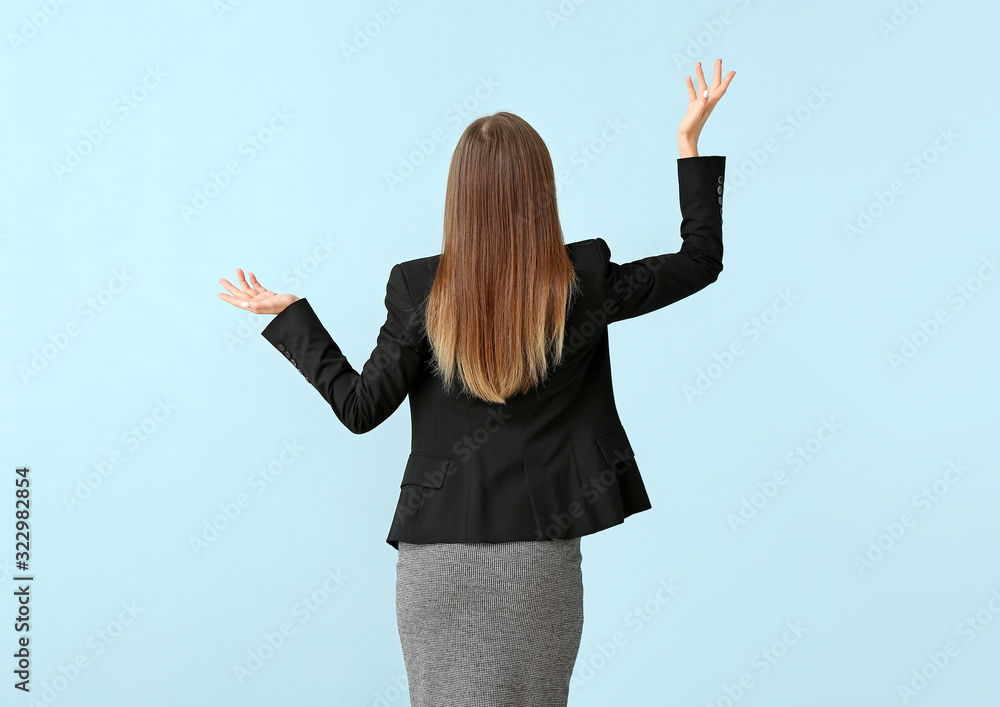 Helpless businesswoman on color background. Concept of choice