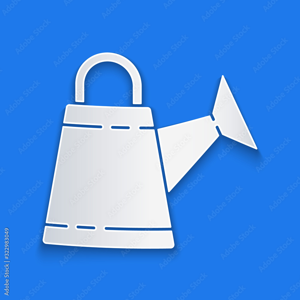 Paper cut Watering can icon isolated on blue background. Irrigation symbol. Paper art style. Vector 