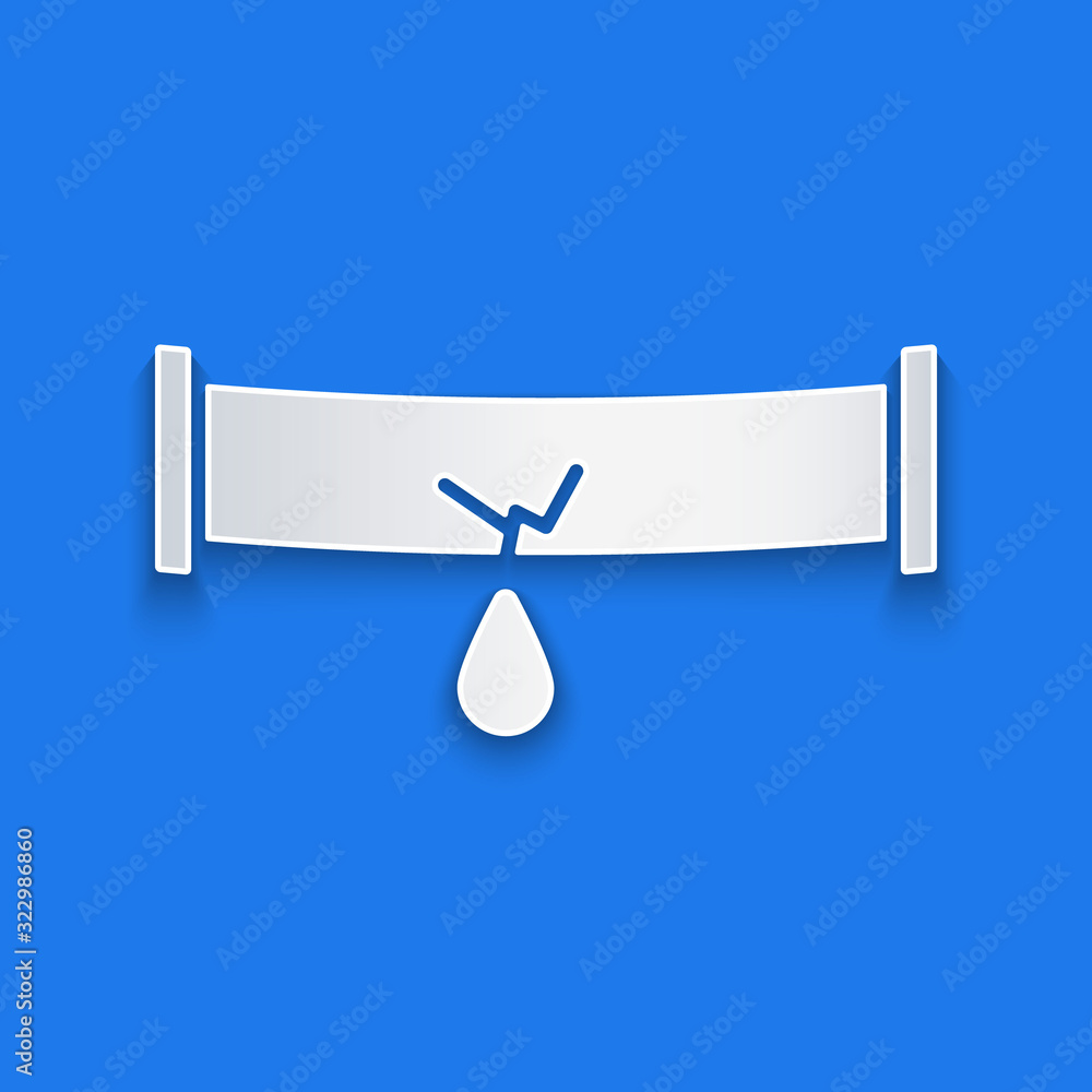 Paper cut Broken metal pipe with leaking water icon isolated on blue background. Paper art style. Ve