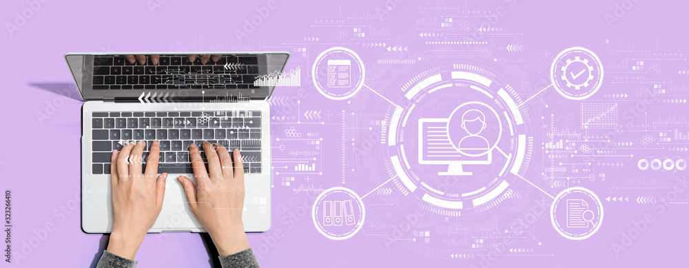 Document management system concept with person using a laptop computer