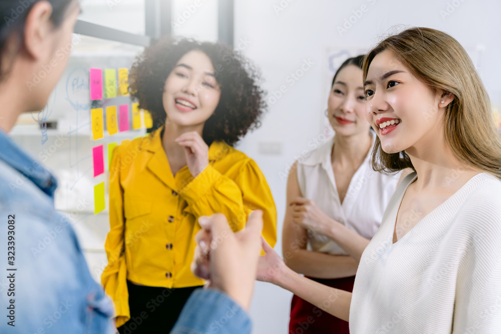 Group of asian young creative happy people entrepreneur on a business meeting office background Good