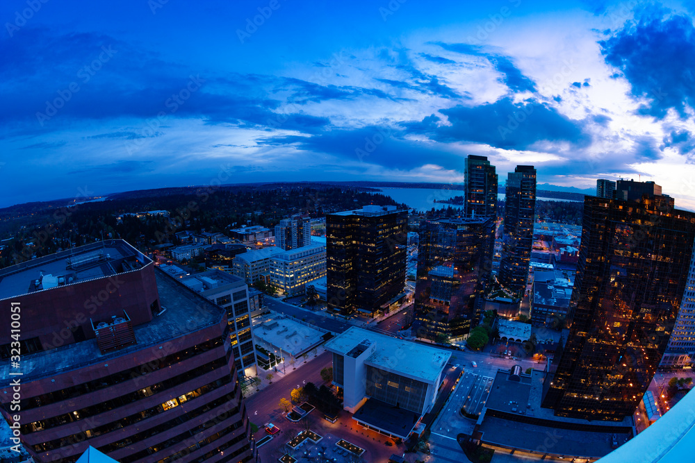 Evening panorama of Bellevue city downtown of King County, United States across Lake Washington from