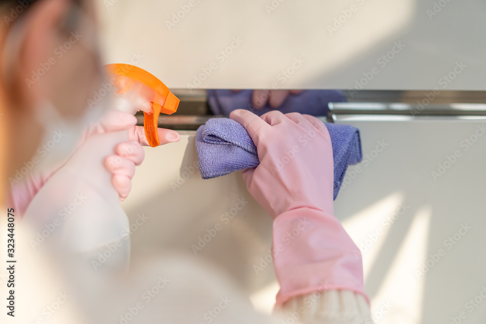 girl cleaning in home