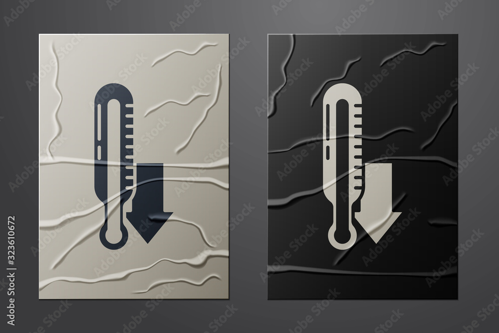 White Meteorology thermometer measuring icon isolated on crumpled paper background. Thermometer equi