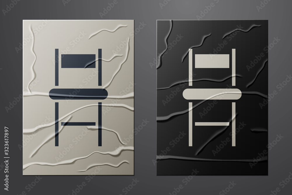 白色椅子图标隔离在皱巴巴的纸背景上。纸艺术风格。矢量插图