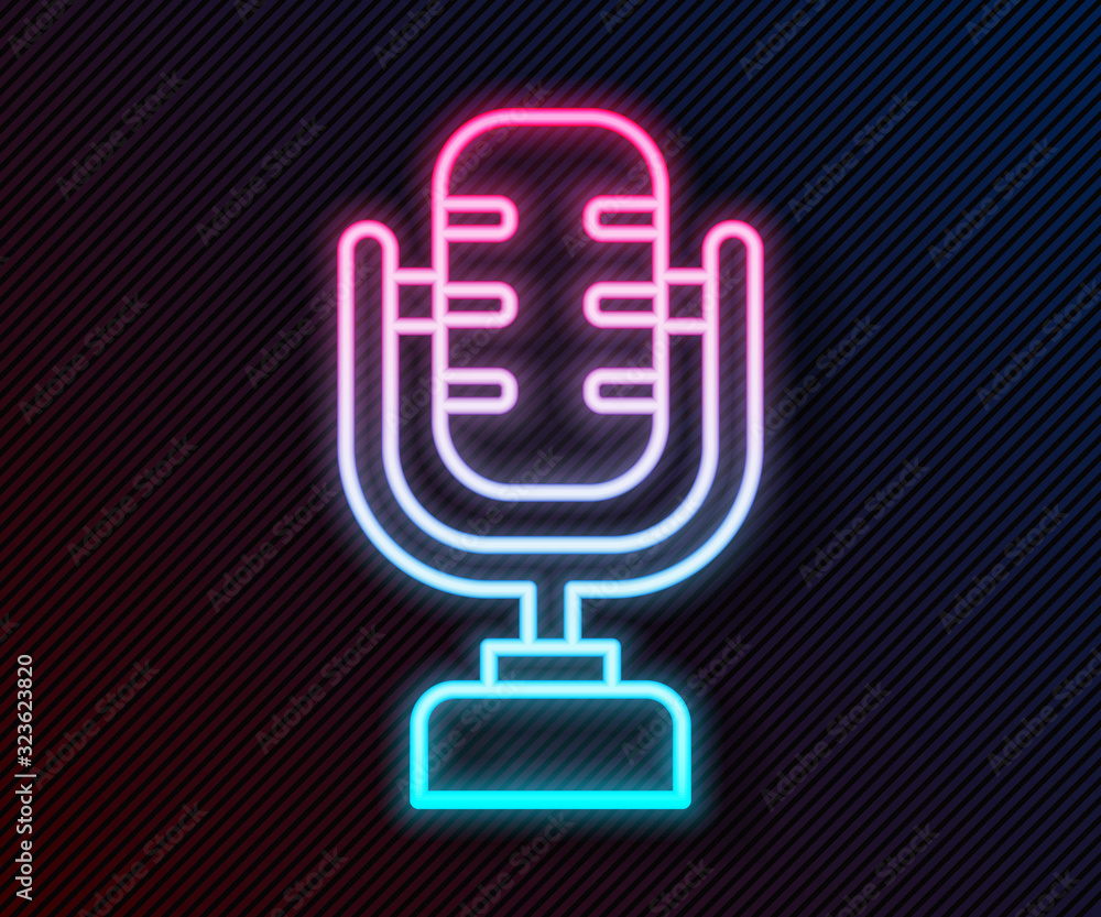 Glowing neon line Microphone icon isolated on black background. On air radio mic microphone. Speaker