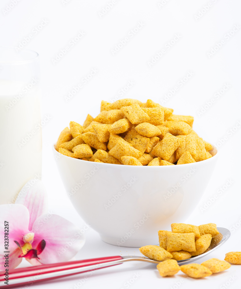 Breakfast cereal, cornflake, chocolate in cups and milk is a healthy breakfast that is healthy for t