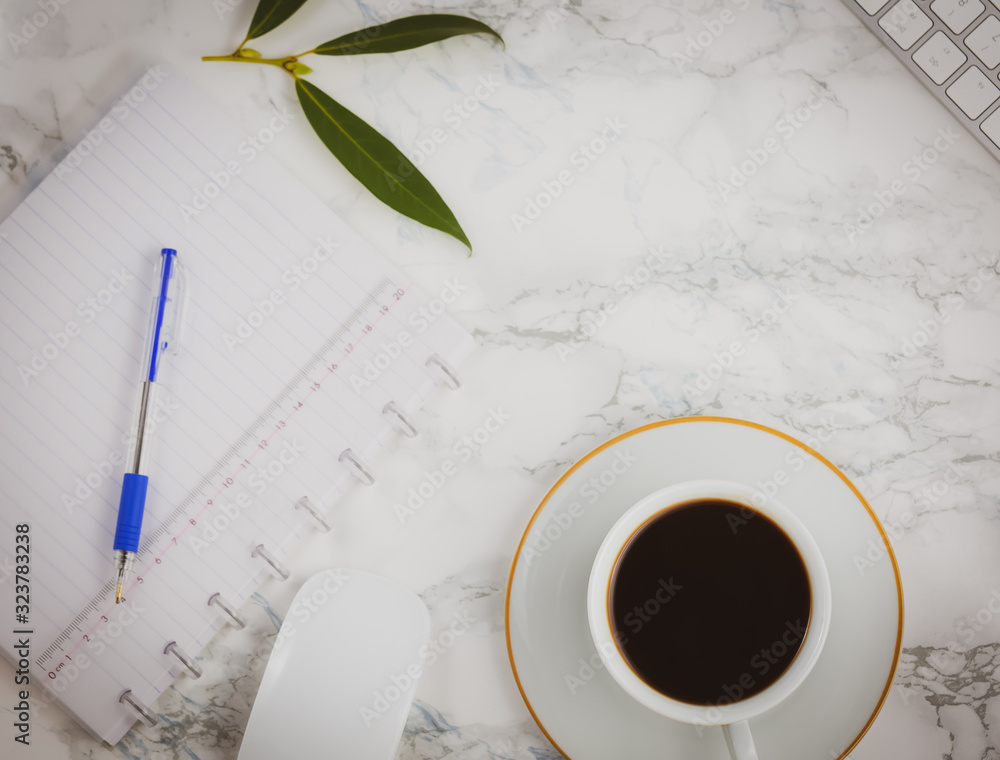 Black coffee on the desk with a computer, mouse Keyboard, book note, and pen Concept of working at h