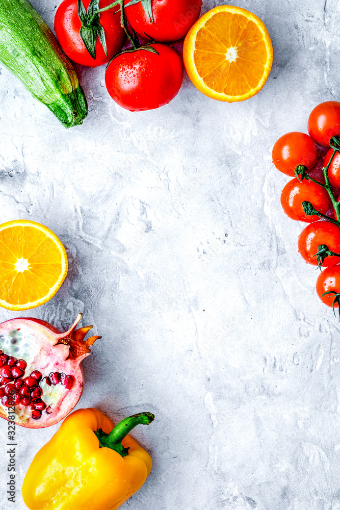 cooking salad with fresh fruits and vegetables on stone background top view mock-up