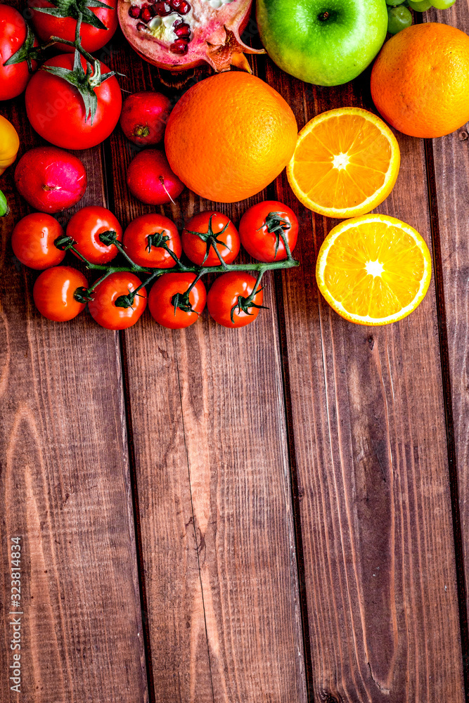 fresh vegetables and fruits for fitness dinner on wooden background top view mockup