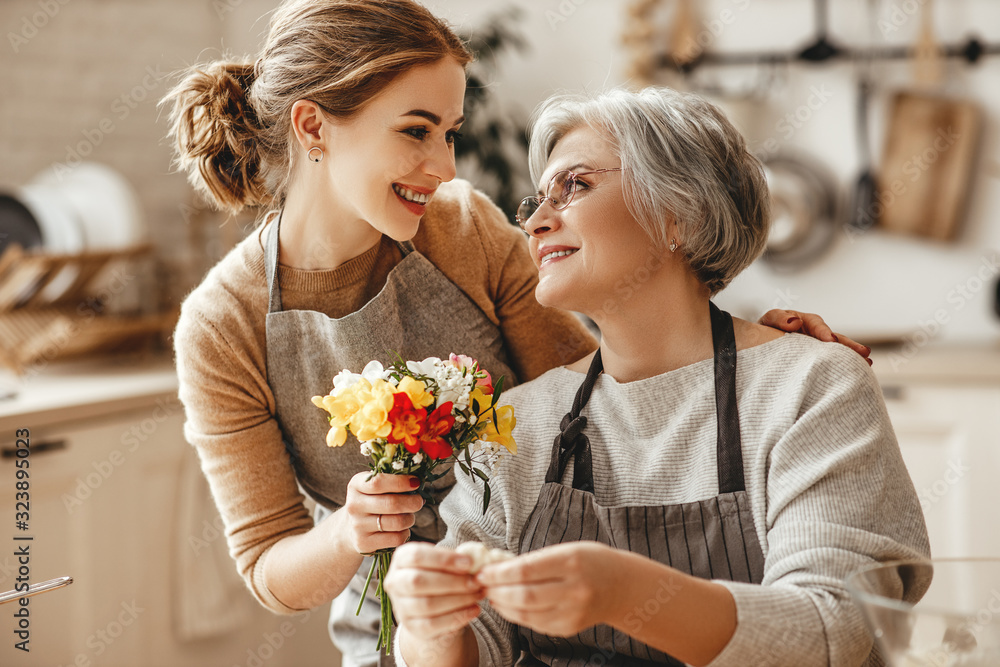 happy mothers day! family old grandmother  mother-in-law and daughter-in-law daughter congratulate 