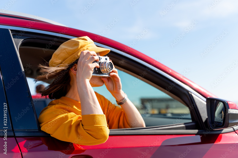 Young photographer taking photos