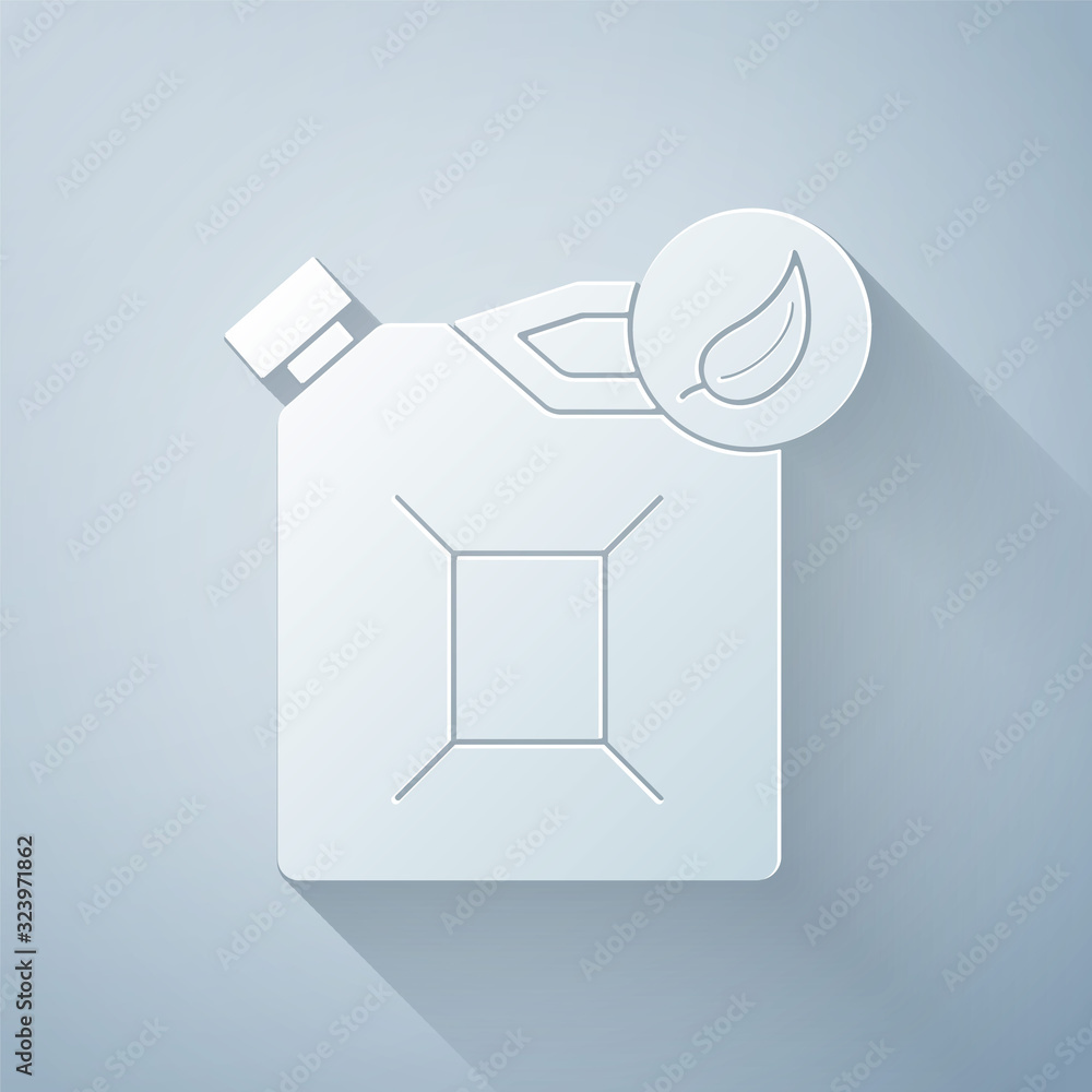 Paper cut Bio fuel canister icon isolated on grey background. Eco bio and barrel. Green environment 