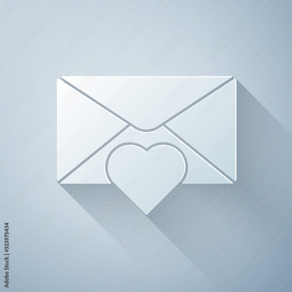 Paper cut Envelope with Valentine heart icon isolated on grey background. Message love. Letter love 