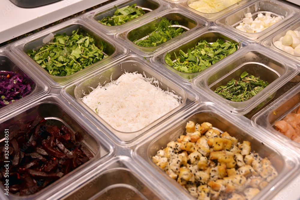 Salad bar with vegetables in the restaurant, healthy food.