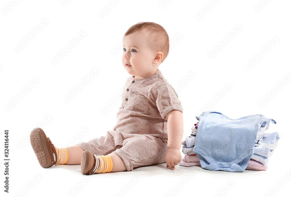 Cute baby with stylish clothes on white background