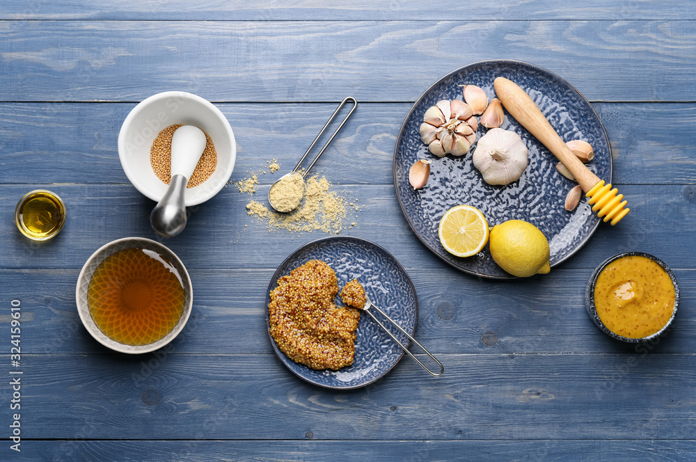 Ingredients for honey mustard sauce on wooden background