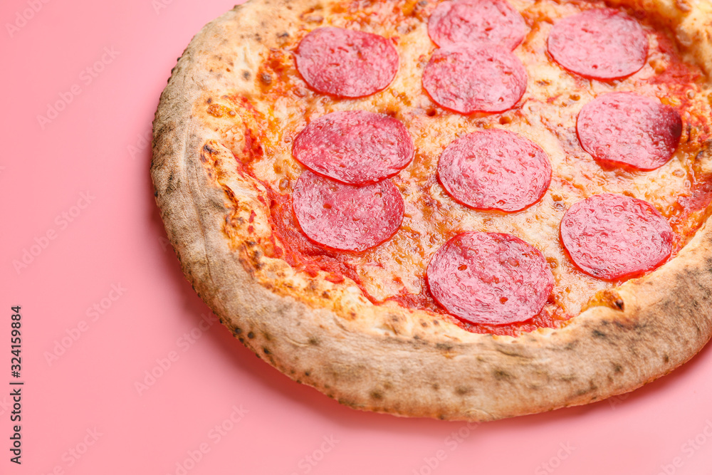 Tasty pizza on color background