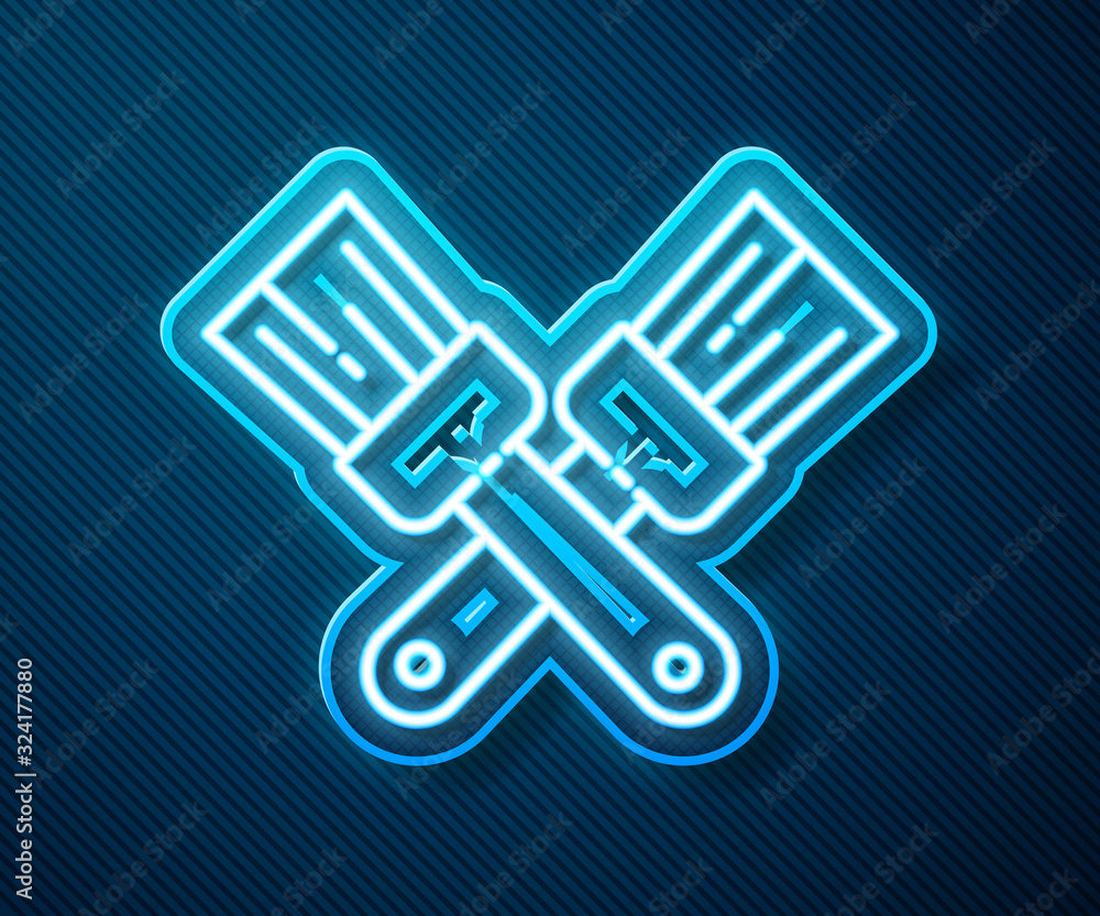 Glowing neon line Crossed paint brush icon isolated on blue background. Vector Illustration